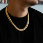 Man wearing 12MM 14KT gold over silver Cuban link chain